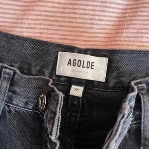 AGOLDE straight leg dark wash jeans.